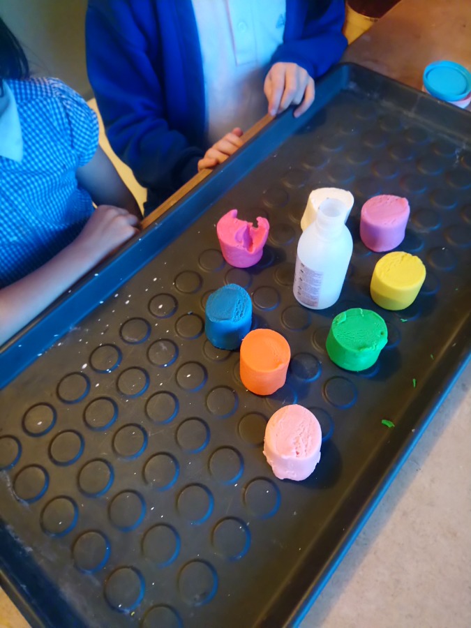 Science party preparing to make a volcano